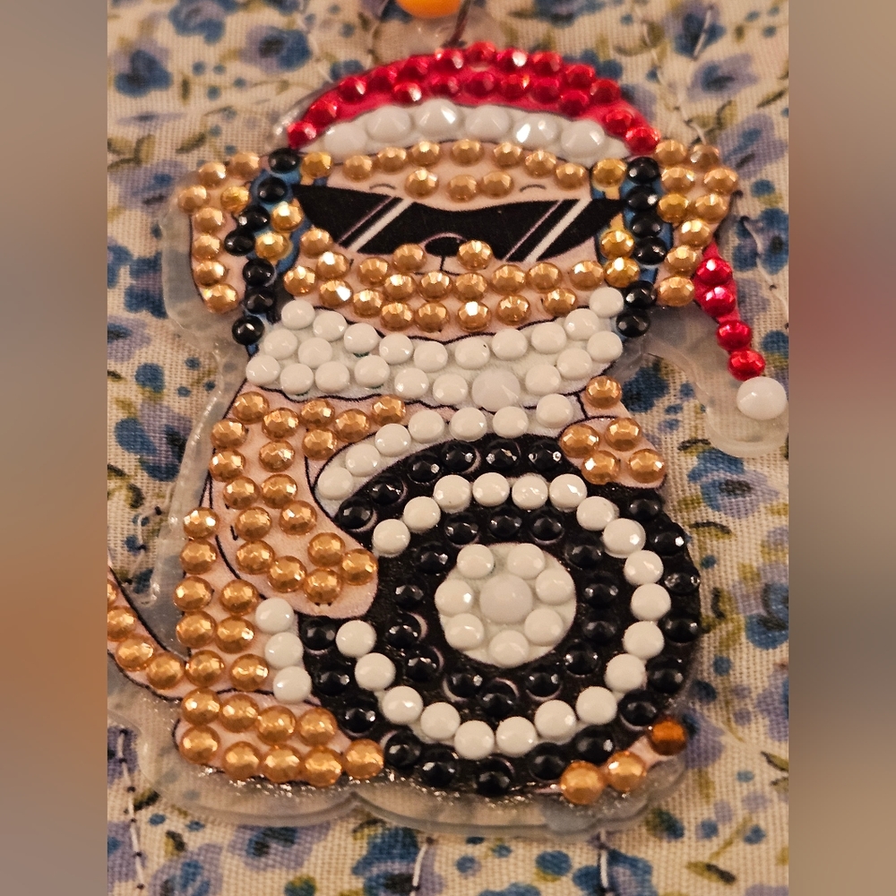 Red and Black Key Holder with Decorative Design